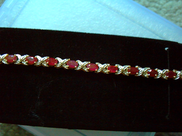 ELEGANT VINTAGE 14K GOLD RUBY TENNIS BRACELET